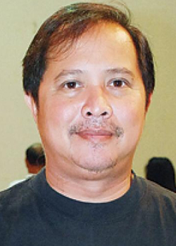 Puttipong Promsaka Na Sakolnakorn (1963)